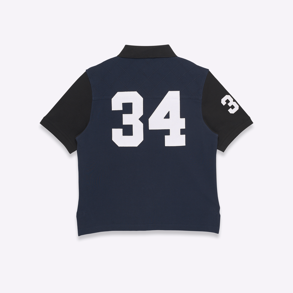 
                      
                        Team Polo shirt in black/navy
                      
                    