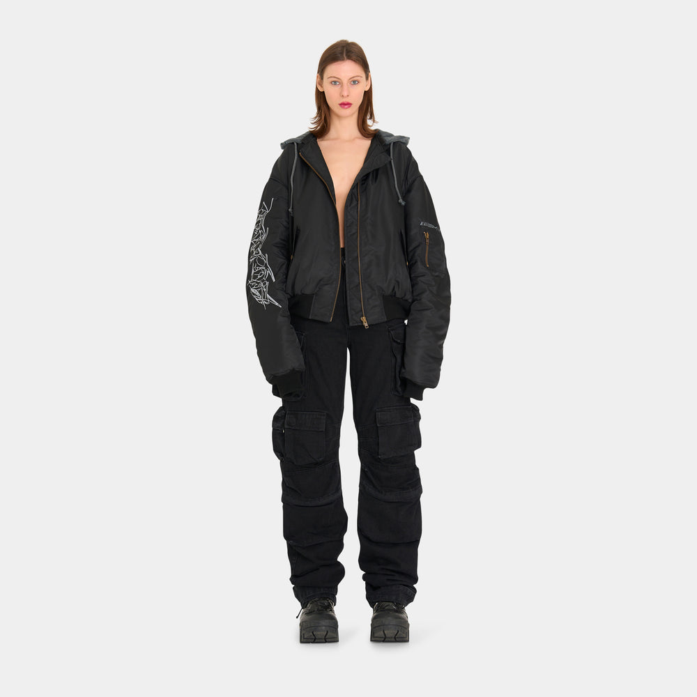 
                      
                        SMYRNAMulti pocket wide cargo pants in black - Jeans
                      
                    