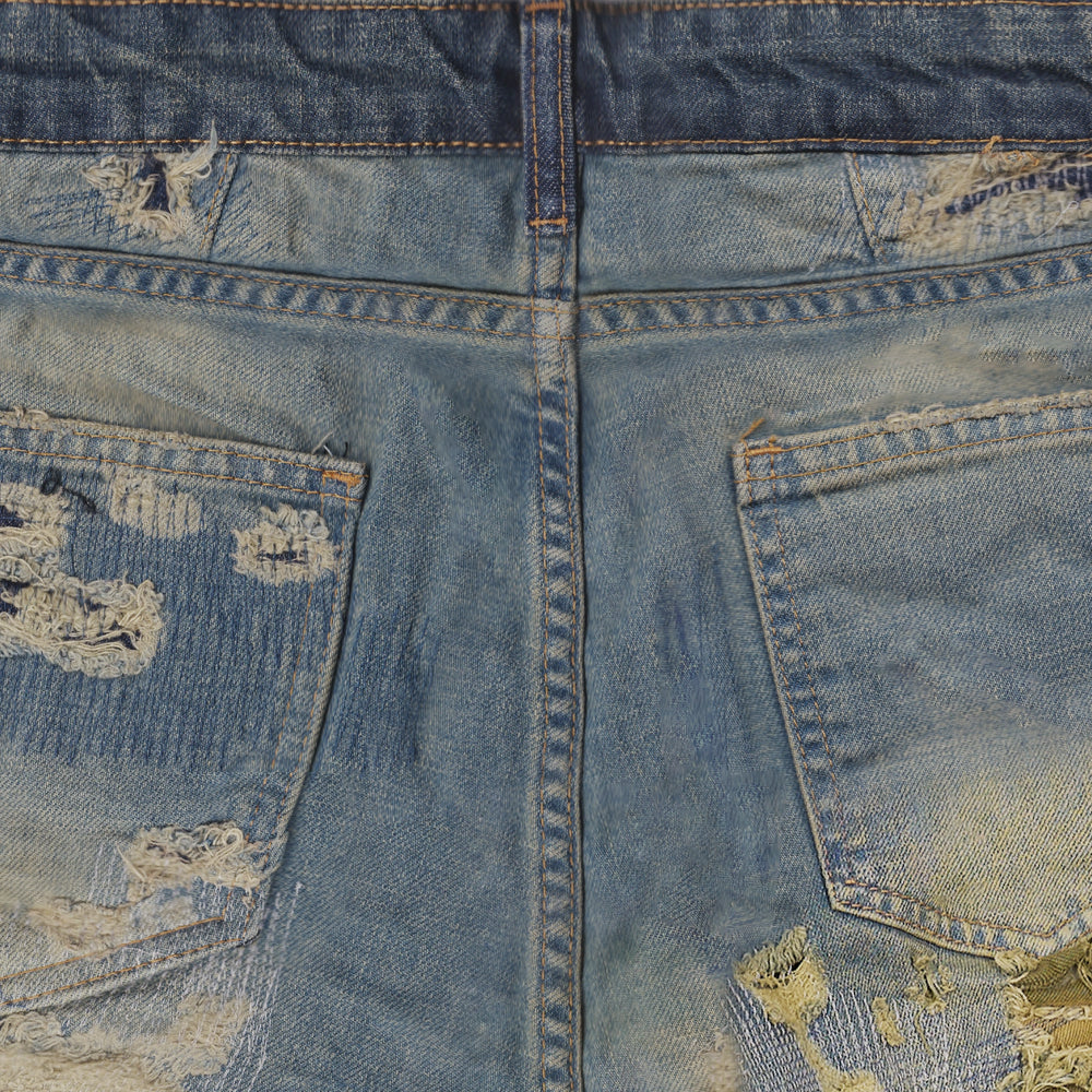 
                      
                        SMYRNADestroyed repair jeans in blue - Jeans
                      
                    